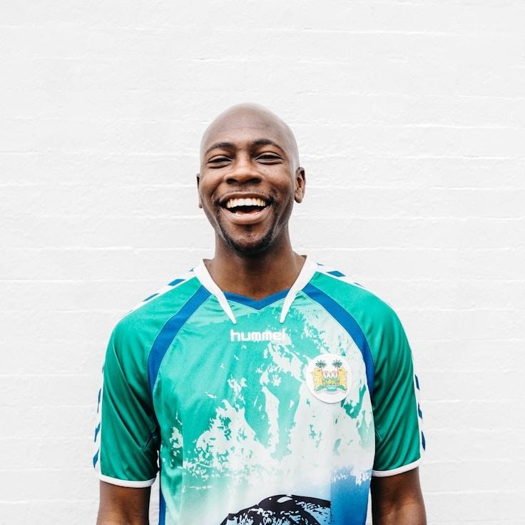 Kaveri Mehta, Lead Design Curator at SmithCliffAtelier, reviewing corporate floral arrangements